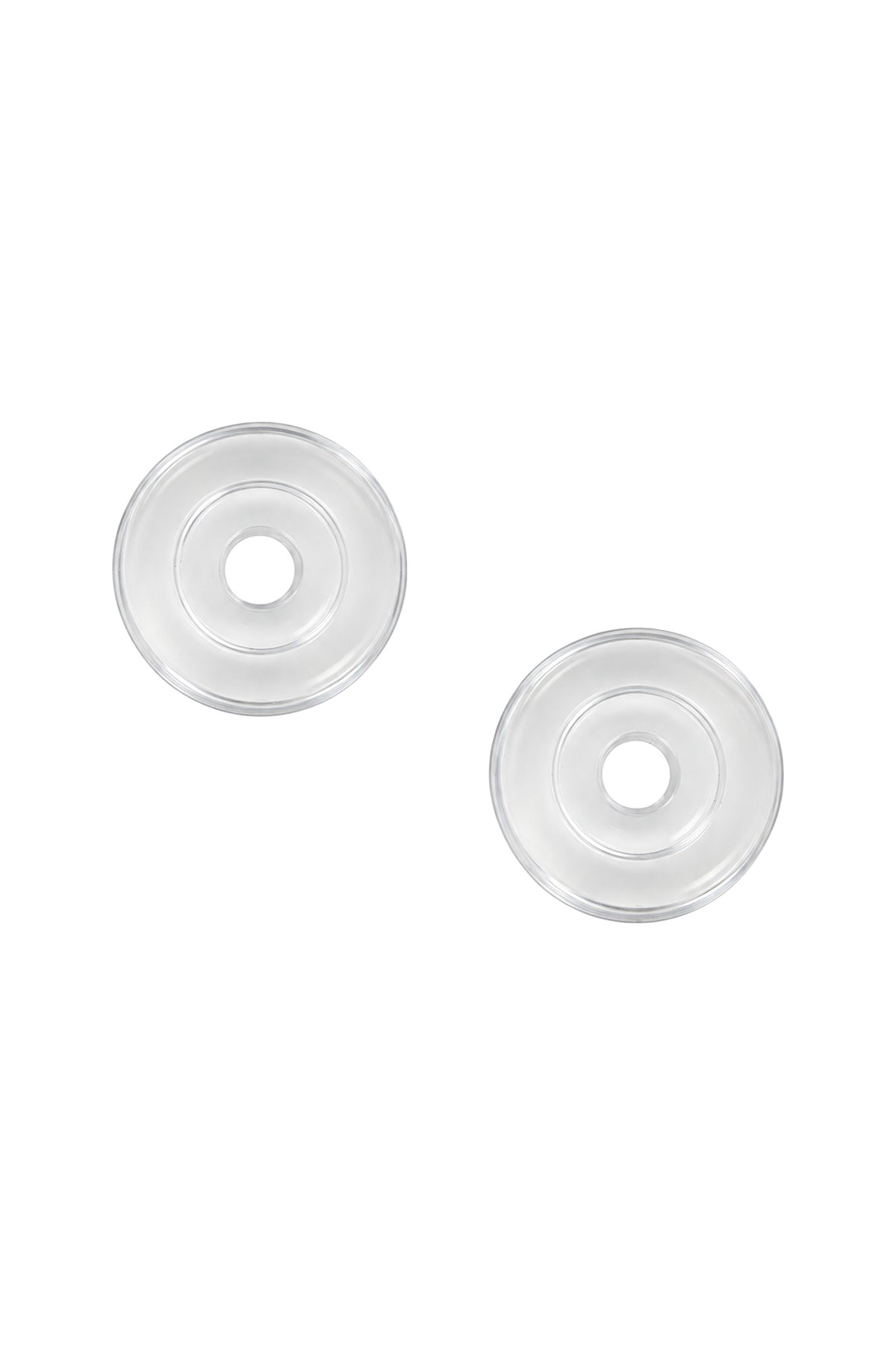 Zwei transparente bernette Gummidämpfer für die Freiarmbasis in Draufsicht