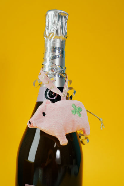 Anhänger für eine Sektflasche zu Silvester
