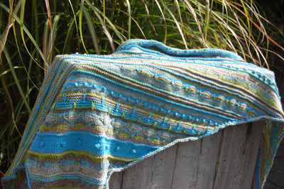 Instructions de tricot pour un châle triangulaire asymétrique (PDF)