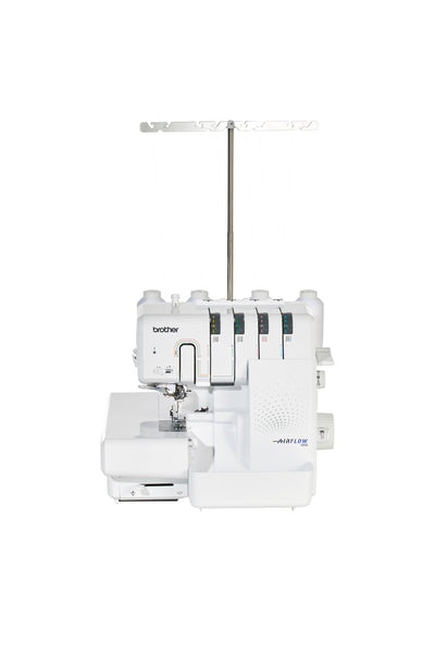 Brother Airflow 3000 overlocker in straight front view with thread stand and threaded white thread cones