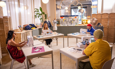 Brother Innov-is M340E in a creative embroidery workshop scene