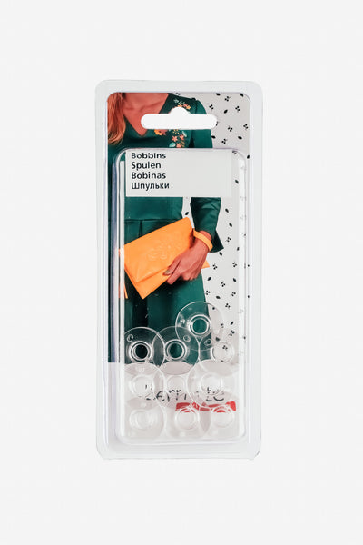 Zu sehen ist die Verpackung mit den 10 transparenten Unterspulen passend für die bernette b70/b77/b79
