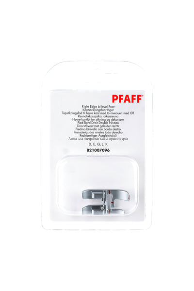 PFAFF Right-side compensating presser foot for the IDT System J K L, in its original, unopened packaging, with the presser foot visible from the front