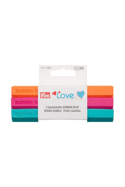PRYM Love BOBBIN BOAT 611983 : trois porte-canettes orange, roses et turquoise dans leur emballage de vente complet