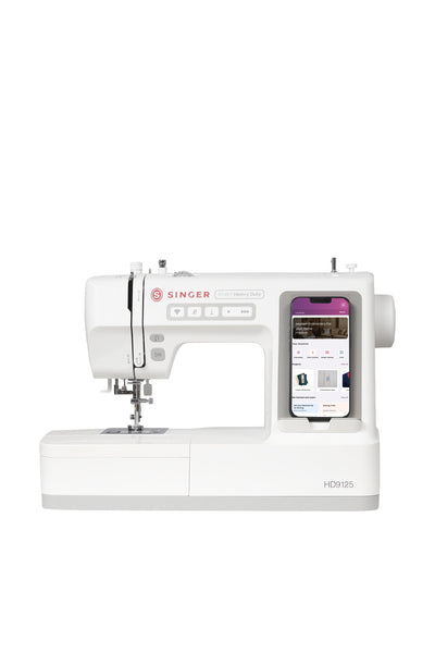 SINGER® Smart Heavy Duty™ 9125 sewing machine, viewed from the front in a straight-on perspective, isolated without a floor shadow
