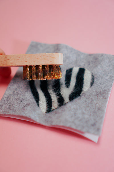 Stickdatei aus Filaine bürsten