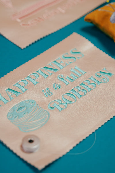 Spruch Nähen: Happiness is a full Bobbin (Stickdatei)