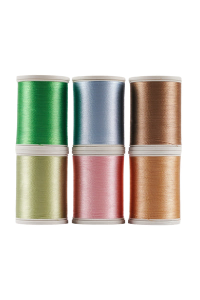 Six SULKY Rayon 40 spools of yarn from the SPRING set in green, pink, and warm natural tones