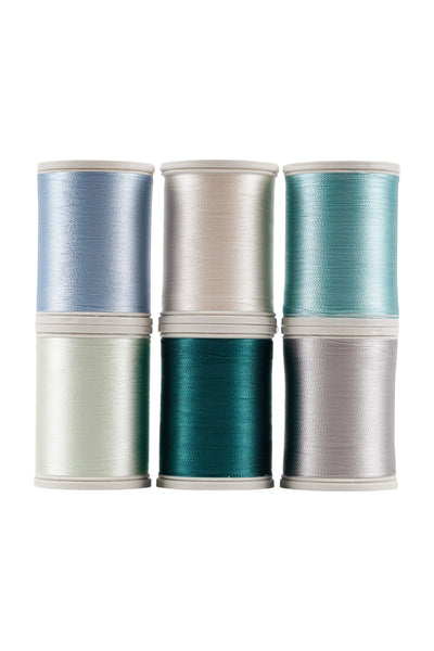 Zes SULKY Rayon 40-garenklossen uit de set WINTERWONDERLAND in blauw, wit en turkoois